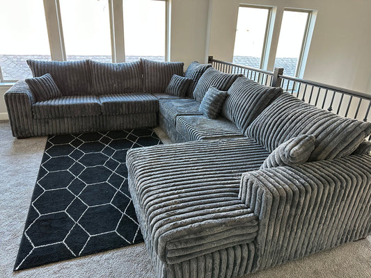 The S320 Texan 4-Piece Sectional offers deep seating, plush cushions, and a bold design. Perfect for gatherings or relaxing in style. Shop now!