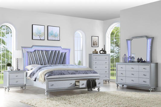 Elevate your space with the B710 Star bedroom set. Features a silver LED platform bed, dresser, mirror, nightstand & chest. Modern style meets luxury!