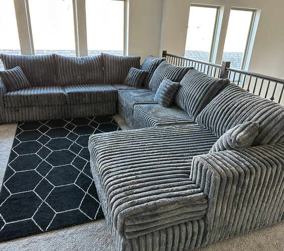 The S320 Texan 4-Piece Sectional offers deep seating, plush cushions, and a bold design. Perfect for gatherings or relaxing in style. Shop now!