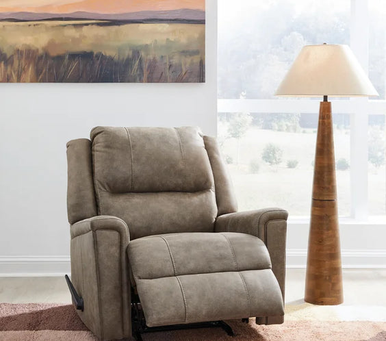 Unwind in the Ashley 5300525 Rocker Recliner. Offers smooth reclining & gentle rocking for total comfort. Shop now at Moda Home for timeless relaxation.