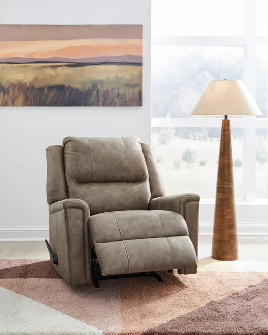 Unwind in the Ashley 5300525 Rocker Recliner. Offers smooth reclining & gentle rocking for total comfort. Shop now at Moda Home for timeless relaxation.