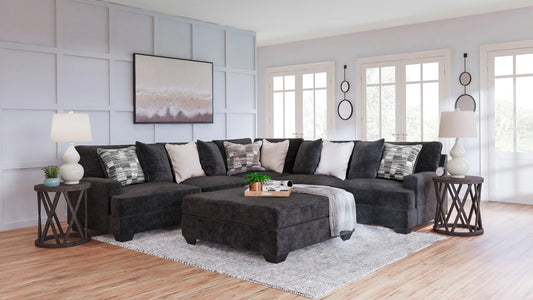 Ashley 596-03 Charcoal Sectional from Moda Home Furniture. Reversible cushions and modern design for maximum comfort in your living room.