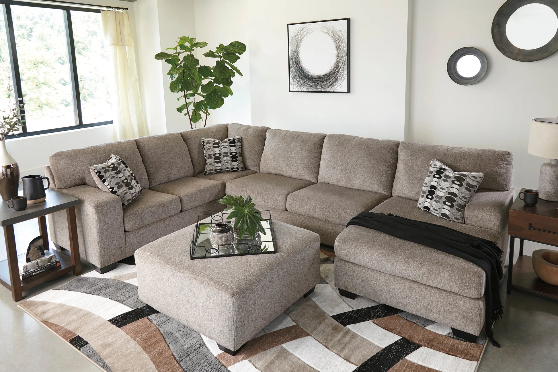Ashley 807-02 Platinum sectional from Moda Home Furniture, featuring elegant platinum fabric, plush cushions, and a spacious 3-piece design for stylish lounging.