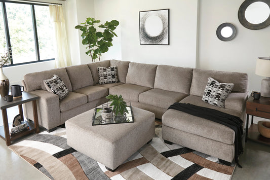 Ashley 807-02 Platinum sectional from Moda Home Furniture, featuring elegant platinum fabric, plush cushions, and a spacious 3-piece design for stylish lounging.