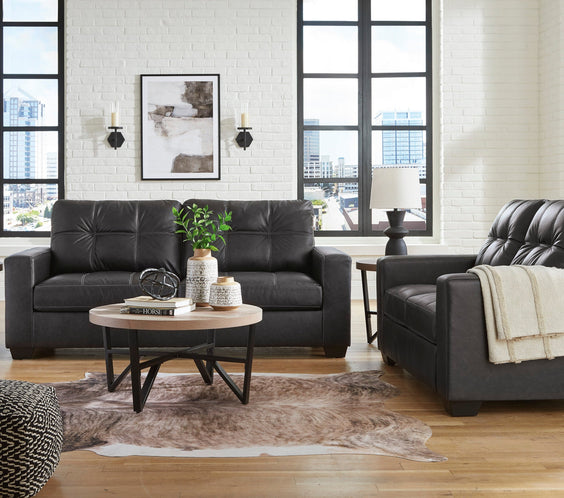 Ashley carbon-colored sofa and loveseat set with spacious seating and modern design by Moda Home Furniture