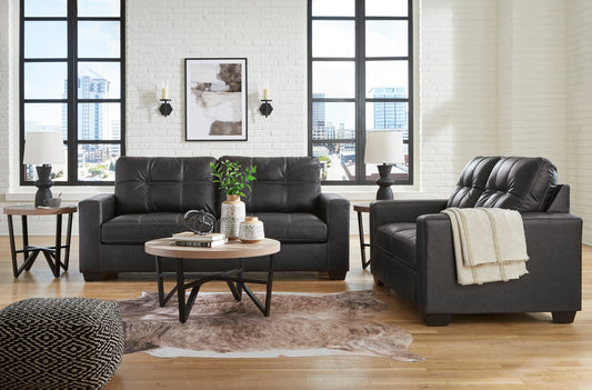 Ashley carbon-colored sofa and loveseat set with spacious seating and modern design by Moda Home Furniture