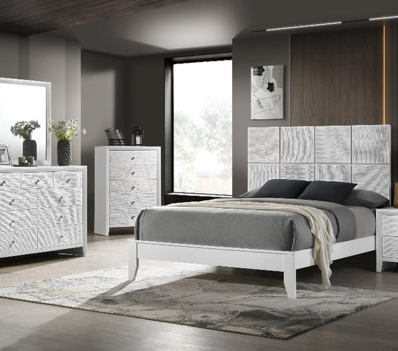 Brighten your bedroom with the Denker White Panel Bedroom Set from Moda Home. A sleek, modern design offering timeless elegance and comfort.
