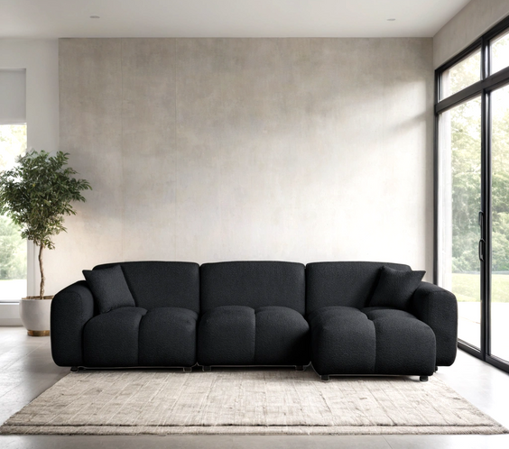 Bella black boucle sectional sofa with plush textured upholstery, stylish and cozy design by Moda Home Furniture