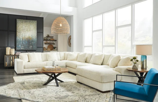 Modern 6-piece sectional with plush RAF chaise. Stylish, comfy & spacious. Shop now at Moda Home Furniture for premium lounging comfort.