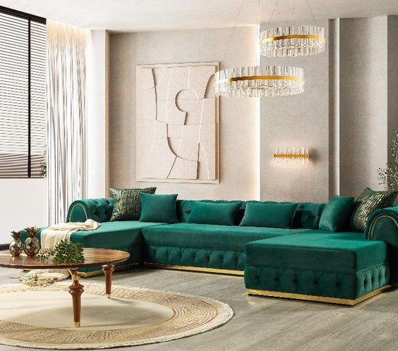 Elevate your space with the Jessie Green Velvet Sectional. Featuring gold accents, plush velvet, and double chaise seating for unmatched style and comfort.