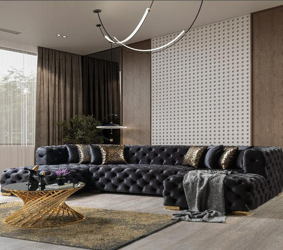 The Neva Black Velvet Sectional features a fully tufted design, handcrafted details, and plush double chaise seating for ultimate elegance and relaxation.