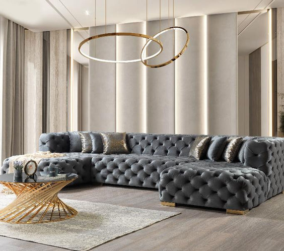 Experience luxury with the Neva Gray Velvet Sectional. Fully tufted, handcrafted, and designed for comfort with a double chaise layout. Perfect for any space.