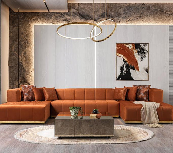 Add bold elegance with the Elisha Orange Velvet Sectional. Featuring plush velvet, channel tufting, and double chaise seating for ultimate style and comfort.