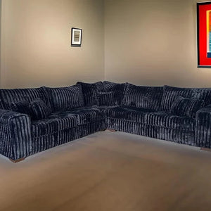 The S345 Noah Black Sectional features plush cushions, spacious seating, and a sleek modern design. Perfect for lounging or entertaining. Shop now!