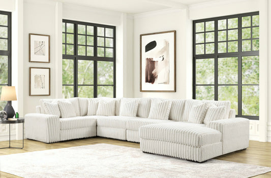 SEASONS2 BEIGE 5PC sectional sofa in soft corduroy from Moda Home Furniture, featuring modular seating and neutral tone for a cozy living room setup.