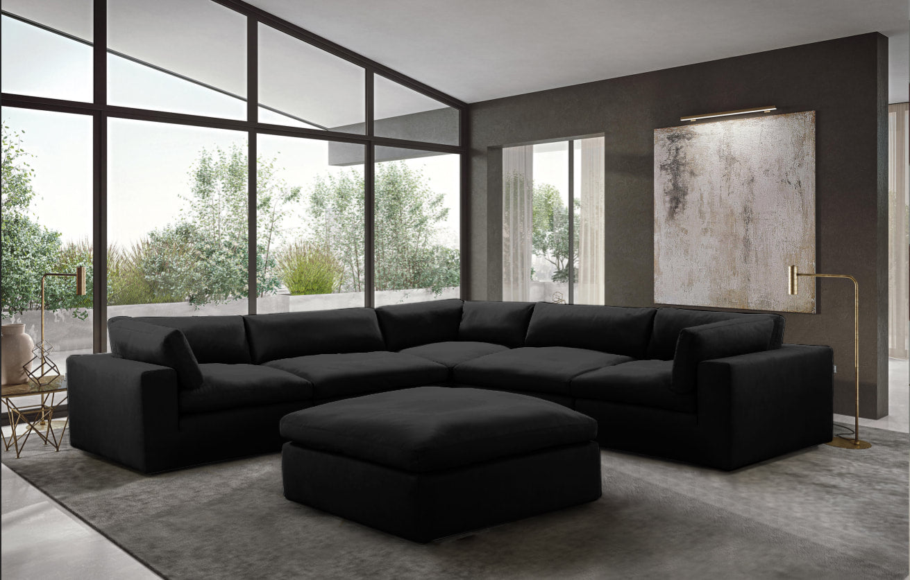 XL CLOUD BLACK sectional with ottoman from Moda Home Furniture featuring stain-resistant fabric and plush feather-fiber cushions for stylish, comfy living.