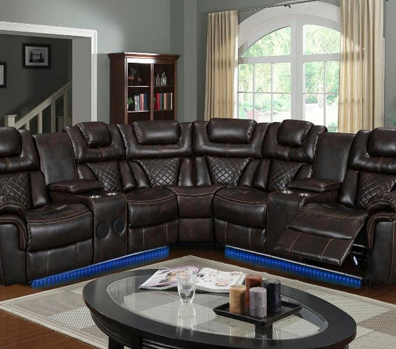 Relax in style with the Alexa Brown Reclining Sectional. Features 2 recliners, LED lights & Bluetooth speakers for the ultimate home experience. Shop now!