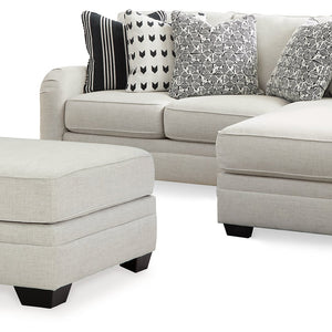 Huntsworth 2-Piece Sectional with Ottoman in Dove Gray