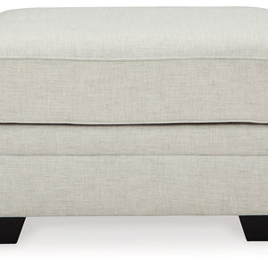 Huntsworth 2-Piece Sectional with Ottoman in Dove Gray