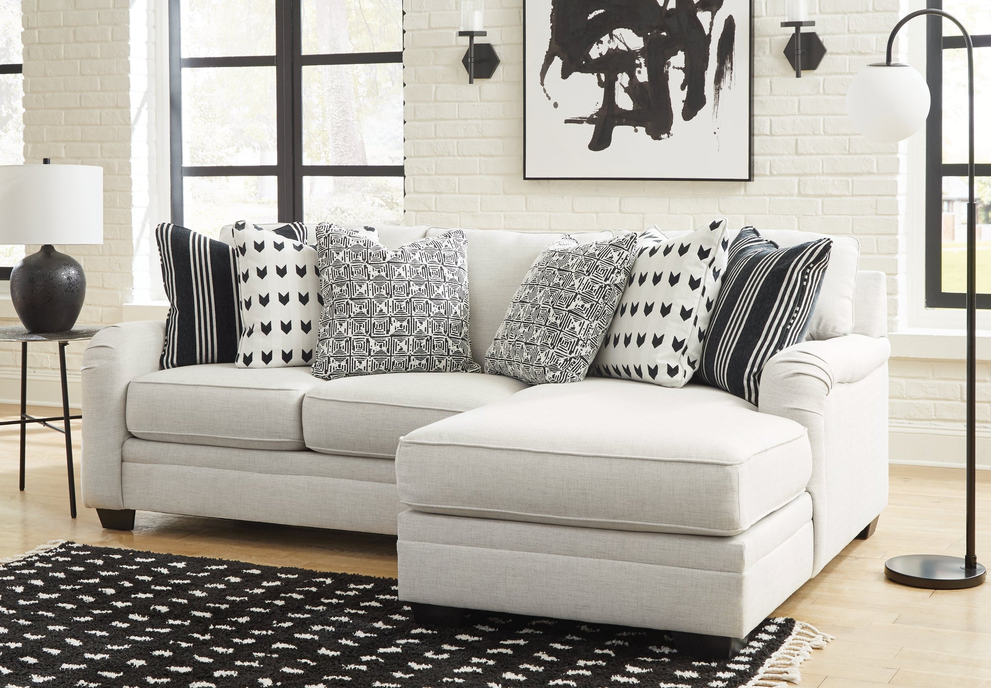 Huntsworth 2-Piece Sectional with Ottoman in Dove Gray