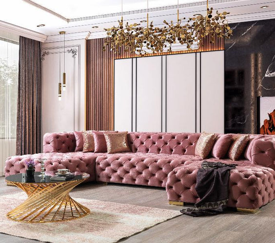 The Neva Pink Velvet Double Chaise Sectional features plush velvet, deep seating, and a modern design—perfect for adding elegance and comfort to any space.