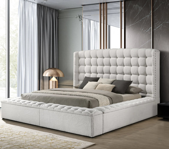 Upgrade your bedroom with the Madonna White Platform Bed from Moda Home Furniture. A sleek and modern design for a stylish, elegant look.