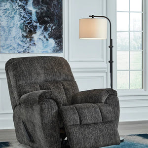 Relax in style with the Ashley 5260625 Rocker Recliner from Moda Home. Enjoy comfort and ease with a gentle rocking motion, perfect for any space.