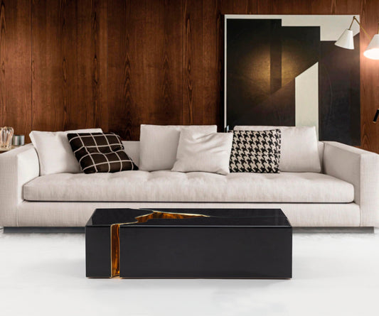 Enhance your space with the Dream Glass black and gold 3-piece coffee table from Moda Home. A sleek, modern centerpiece with a luxurious touch.