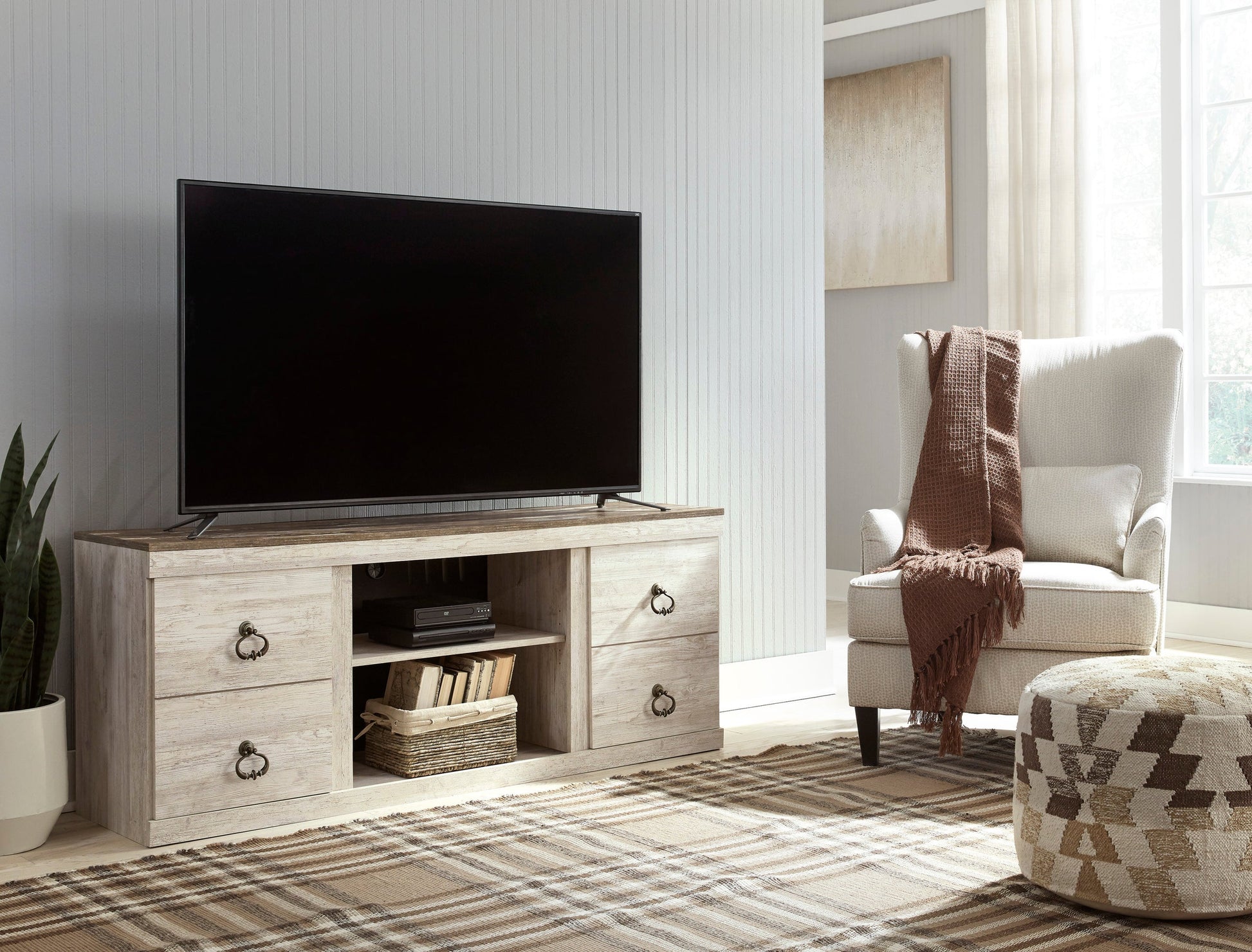 60-inch TV stand with whitewash finish, adjustable shelves, and sleek modern design. Perfect for contemporary living rooms and entertainment spaces.