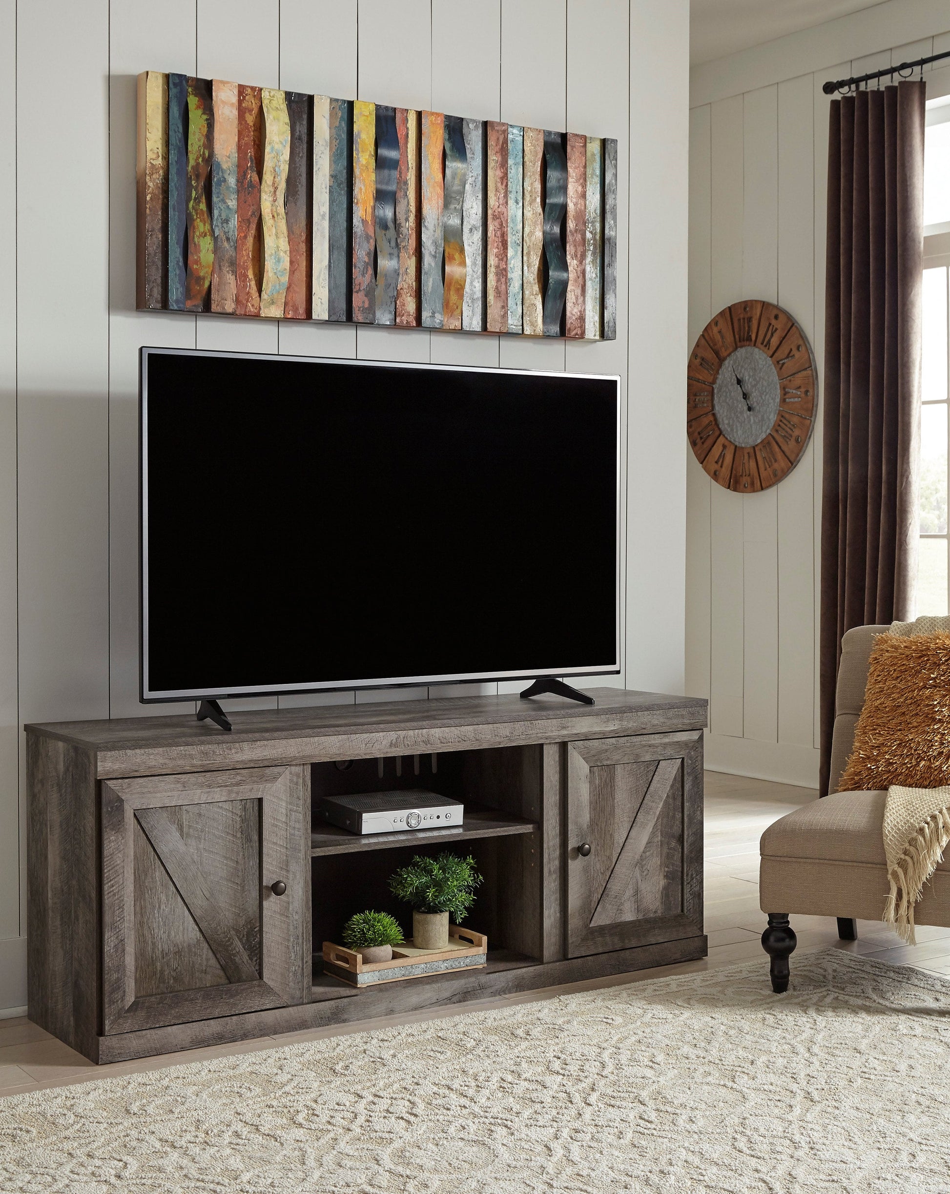 Upgrade your space with this 60" gray TV stand featuring open shelves and closed cabinets. Its sleek design provides ample storage for a modern, organized living room.